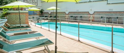 Outdoor pool, open 9:00 AM to 6:30 PM, pool umbrellas, sun loungers