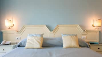 Luxe beddengoed, een minibar, een kluis op de kamer, een bureau