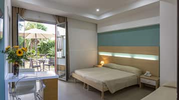 Habitación familiar | Sábanas italianas Frette, colchones Select Comfort, minibar