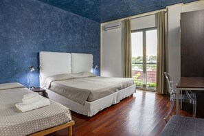 Family Room | Frette Italian sheets, Select Comfort beds, minibar, in-room safe