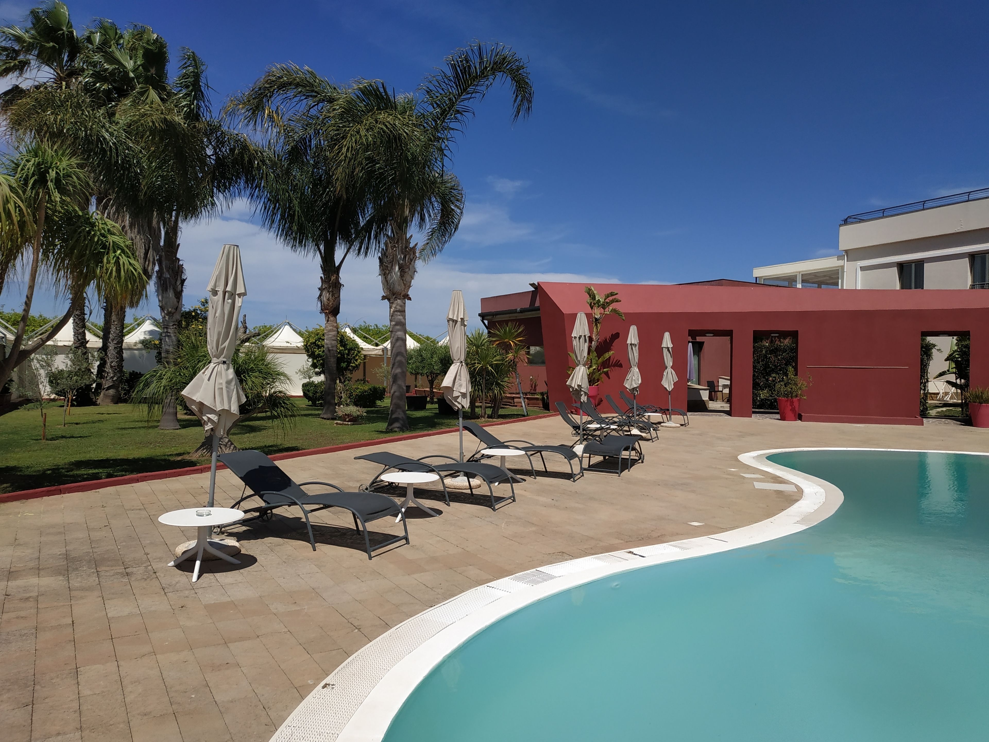 seasonal outdoor pool, pool umbrellas, pool loungers