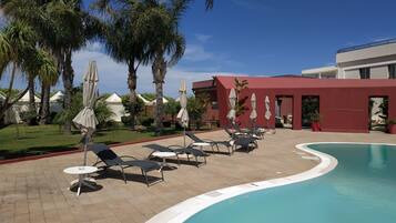 Seasonal outdoor pool, pool umbrellas, sun loungers