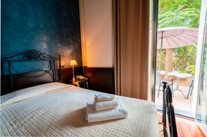 Chambre simple | Draps italiens de Frette, lit avec matelas Select Comfort, minibar