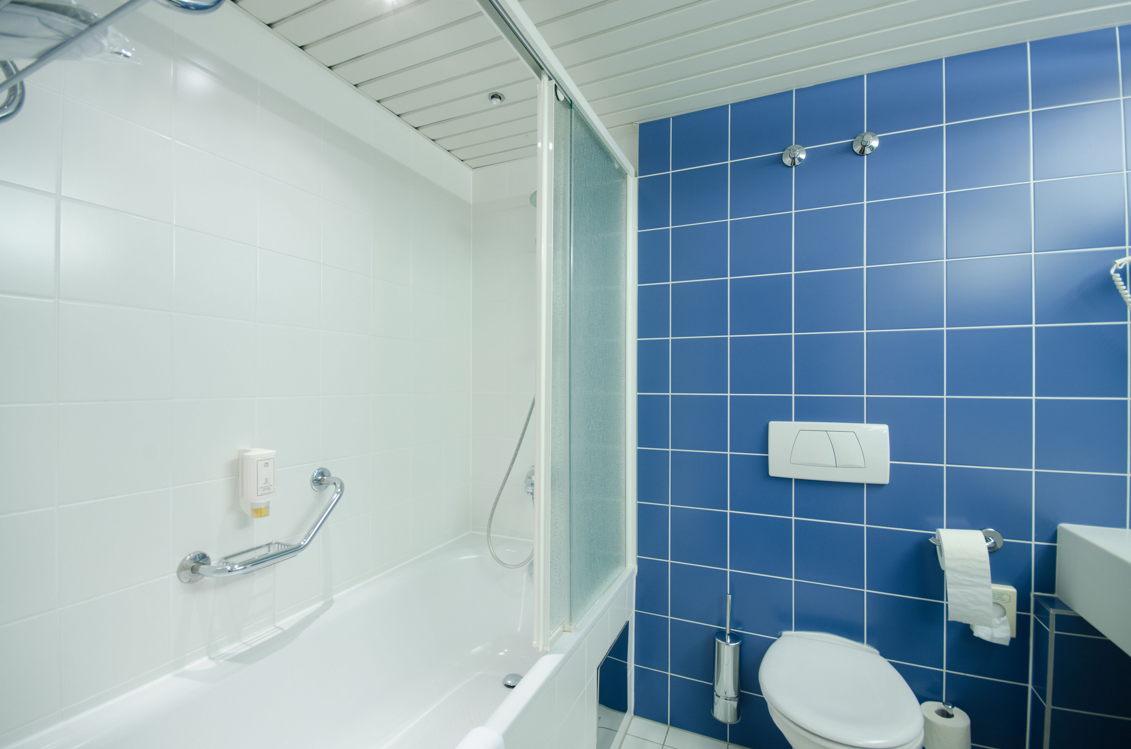 double room | bathroom | bathtub, deep-soaking bathtub, free toiletries, hair dryer