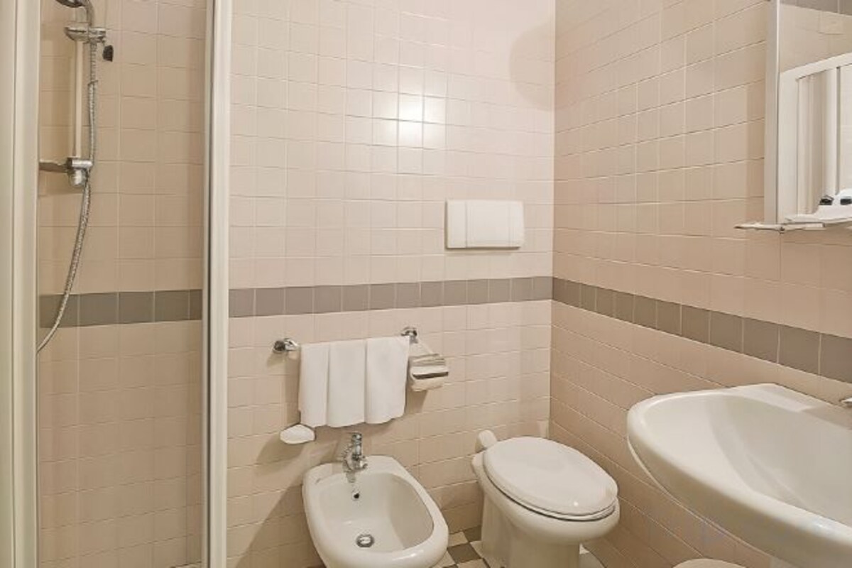 Bathroom | Shower, hair dryer, bidet, towels