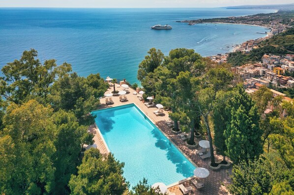 Outdoor pool, pool umbrellas, pool loungers