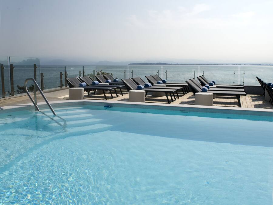 Outdoor pool, pool umbrellas, pool loungers