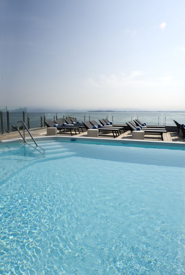 Outdoor pool, pool umbrellas, pool loungers