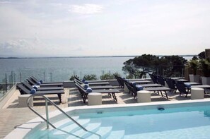 Outdoor pool, pool umbrellas, pool loungers
