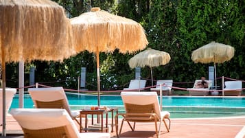 Seasonal outdoor pool, pool umbrellas, pool loungers