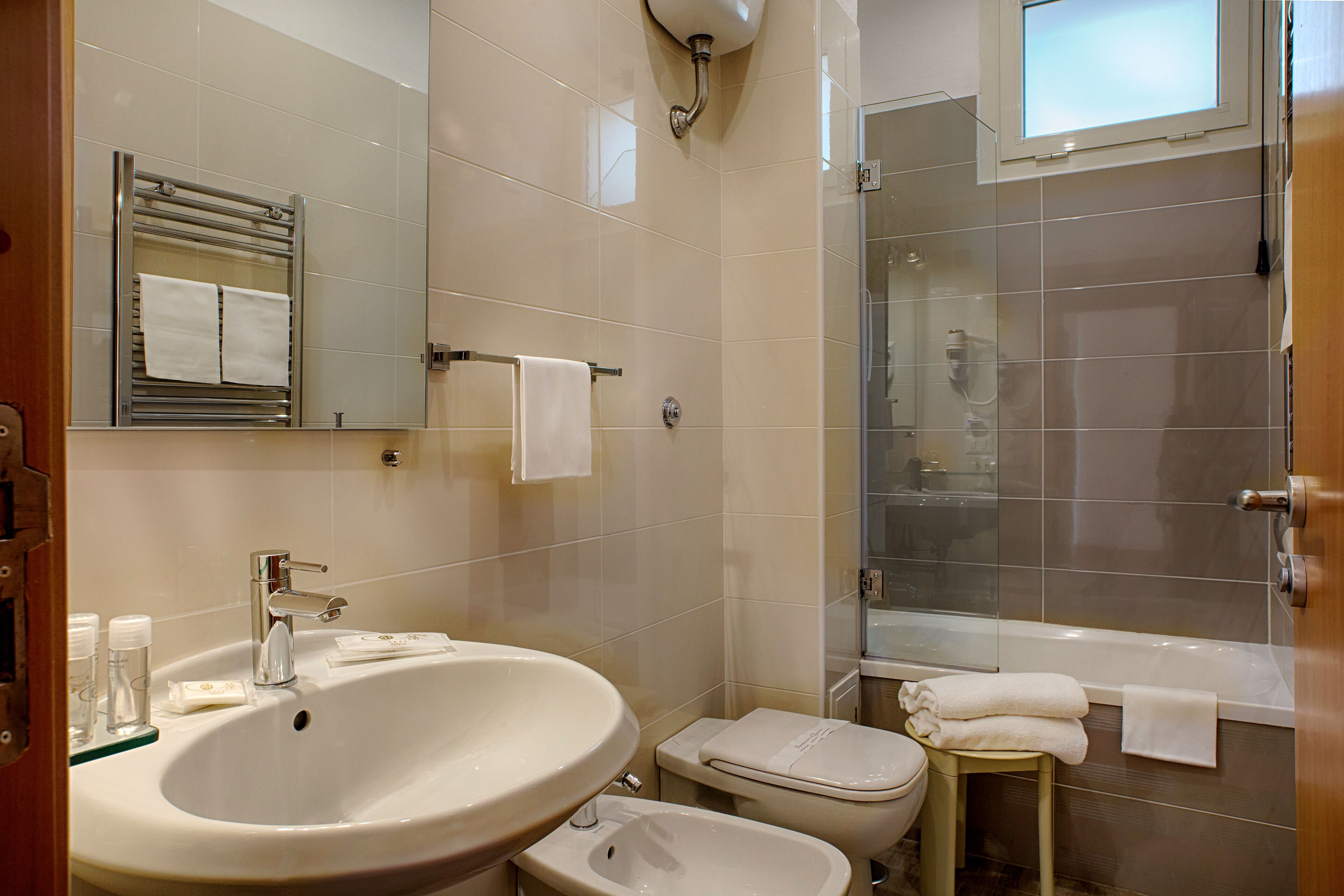superior double room | bathroom | shower, rainfall showerhead, free toiletries, hair dryer