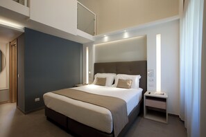 Toetasjesleilighet – deluxe | Sengetøy av topp kvalitet, dundyner, minibar og safe på rommet