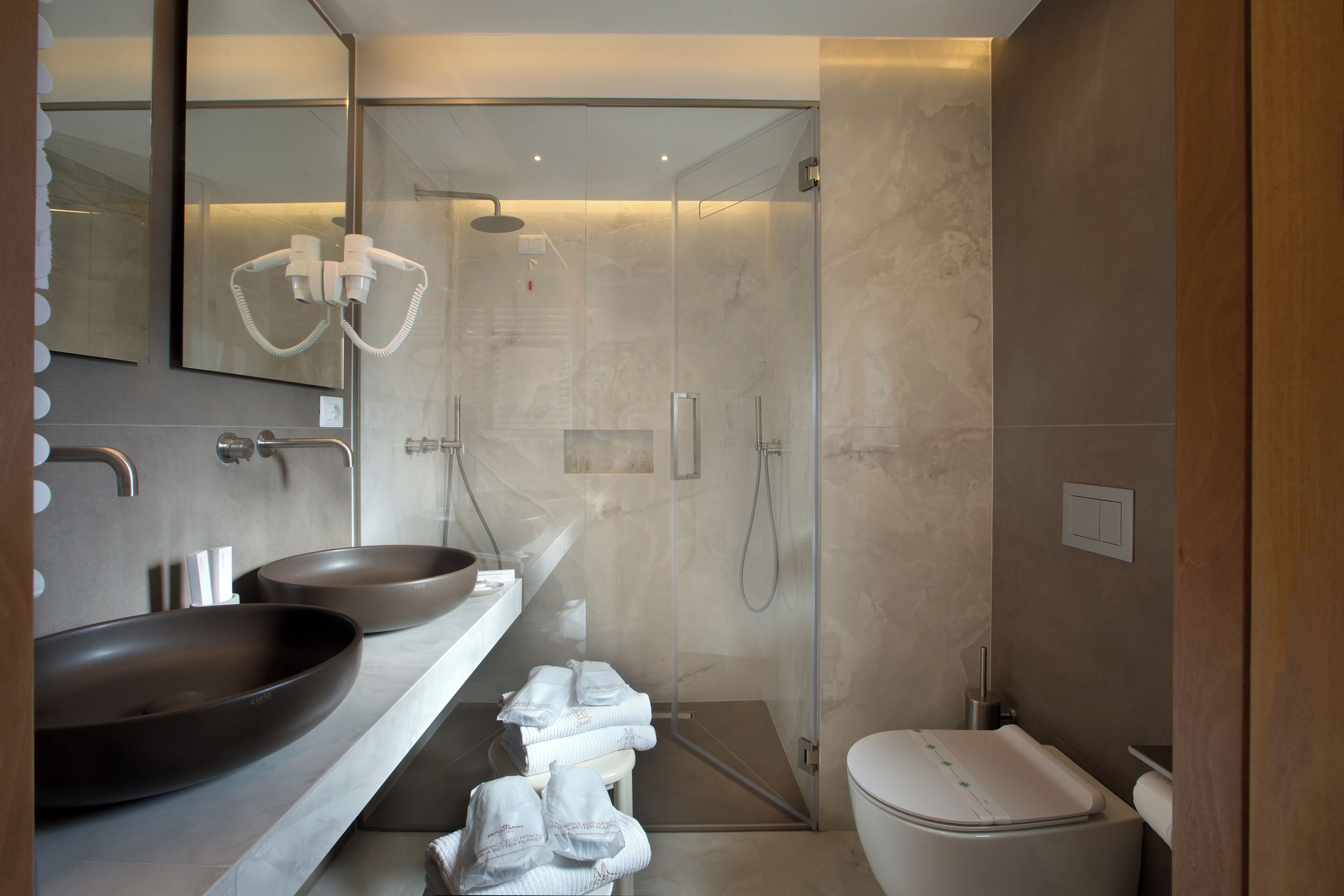 deluxe duplex | bathroom | shower, rainfall showerhead, free toiletries, hair dryer