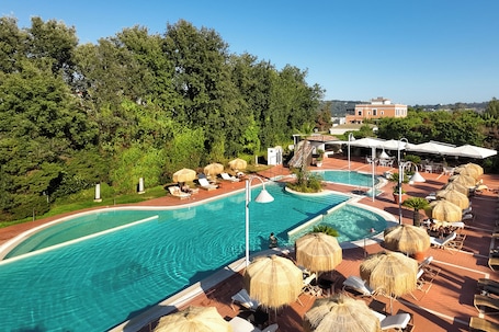 Seasonal outdoor pool, open 10:00 AM to 6:00 PM, pool umbrellas. Montespina Park Hotel