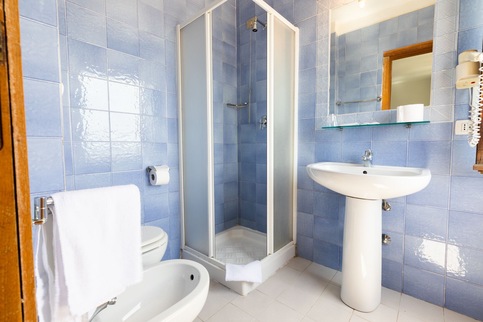 deep-soaking bathtub, rainfall showerhead, free toiletries, hair dryer