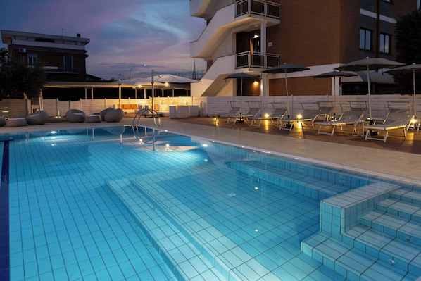 Outdoor pool, open 8 AM to 7 PM, pool umbrellas, sun loungers