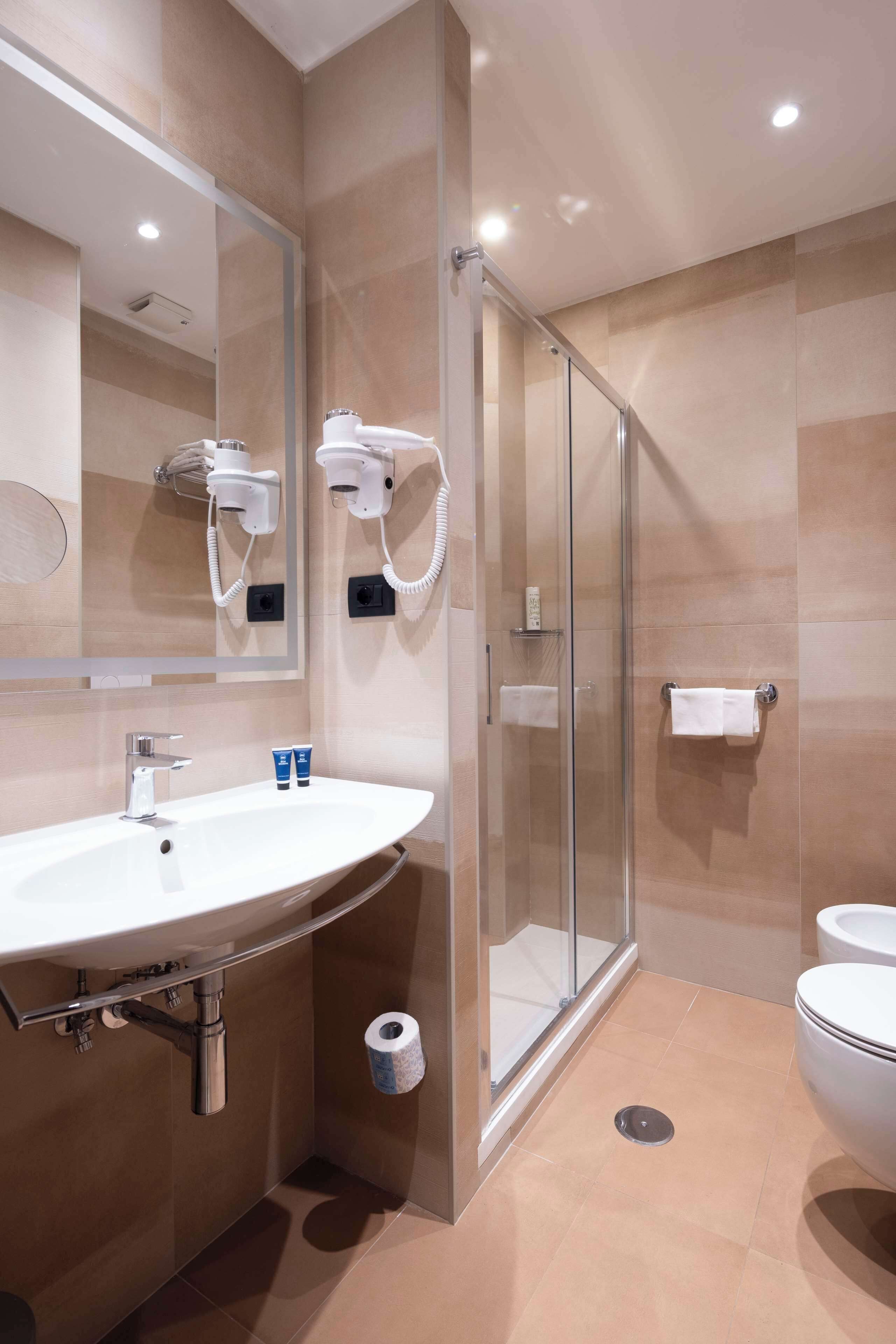 shower, rainfall showerhead, hair dryer, bidet