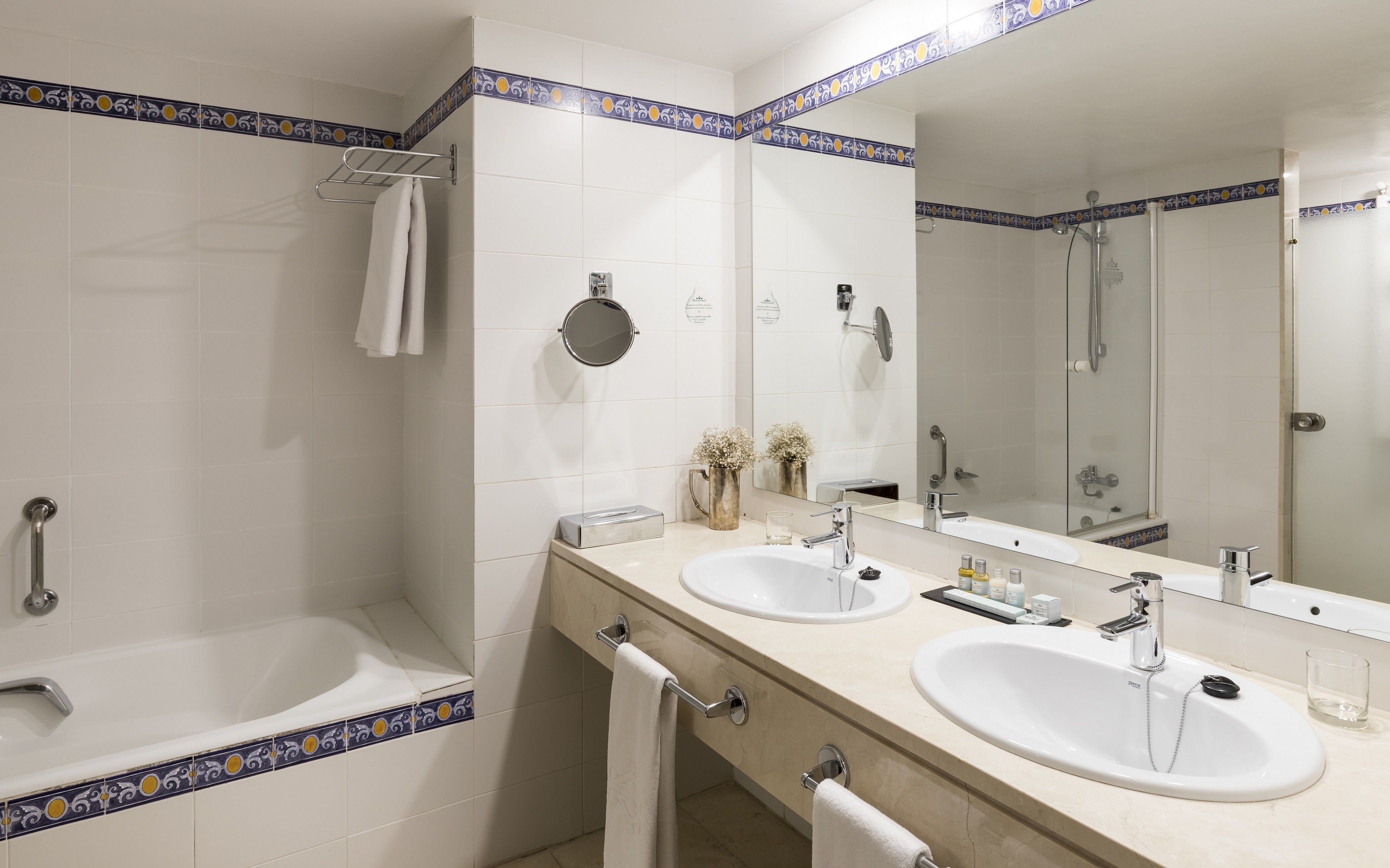 deep-soaking bathtub, eco-friendly toiletries, hair dryer, bidet