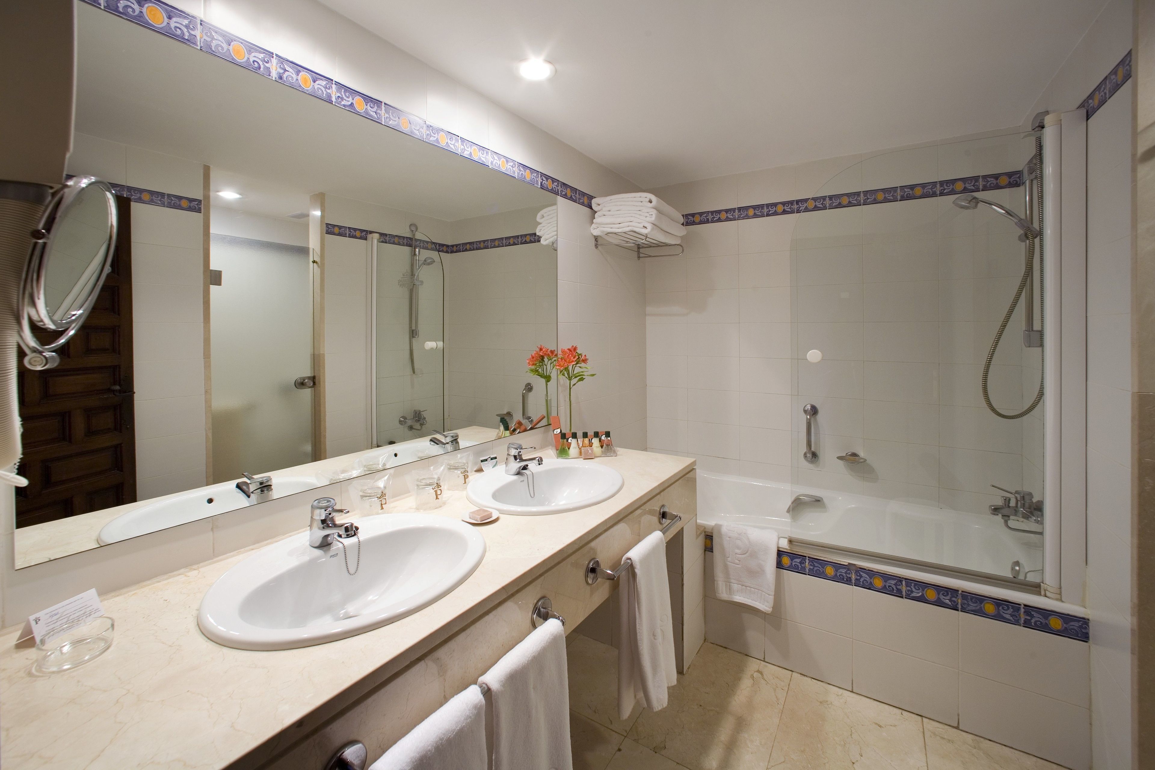 deep-soaking bathtub, eco-friendly toiletries, hair dryer, bidet