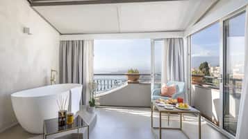 Exclusive Suite, Bathtub, Sea View (Sea and Etna view) | 1 bedroom, minibar, in-room safe, desk