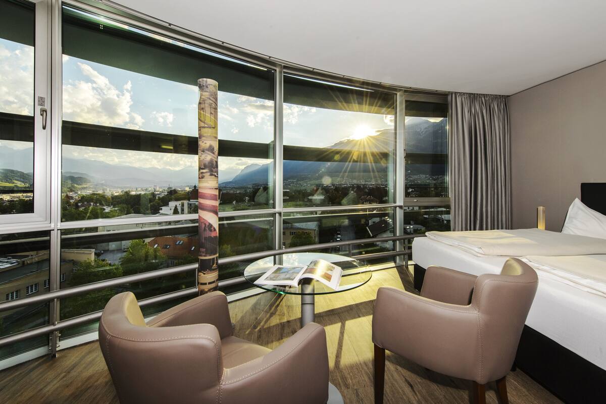 double room superior - glass tower | living area | flat-screen tv, pay films