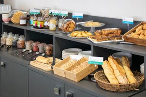 Daily buffet breakfast (EUR 14 per person)