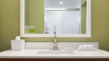 Designer toiletries, hair dryer, bathrobes, towels