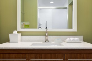 Designer toiletries, hair dryer, bathrobes, towels