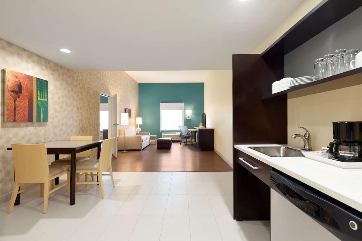 suite, 1 king bed, accessible (roll in shower) | private kitchen | fridge, microwave, dishwasher, cookware/dishes/utensils