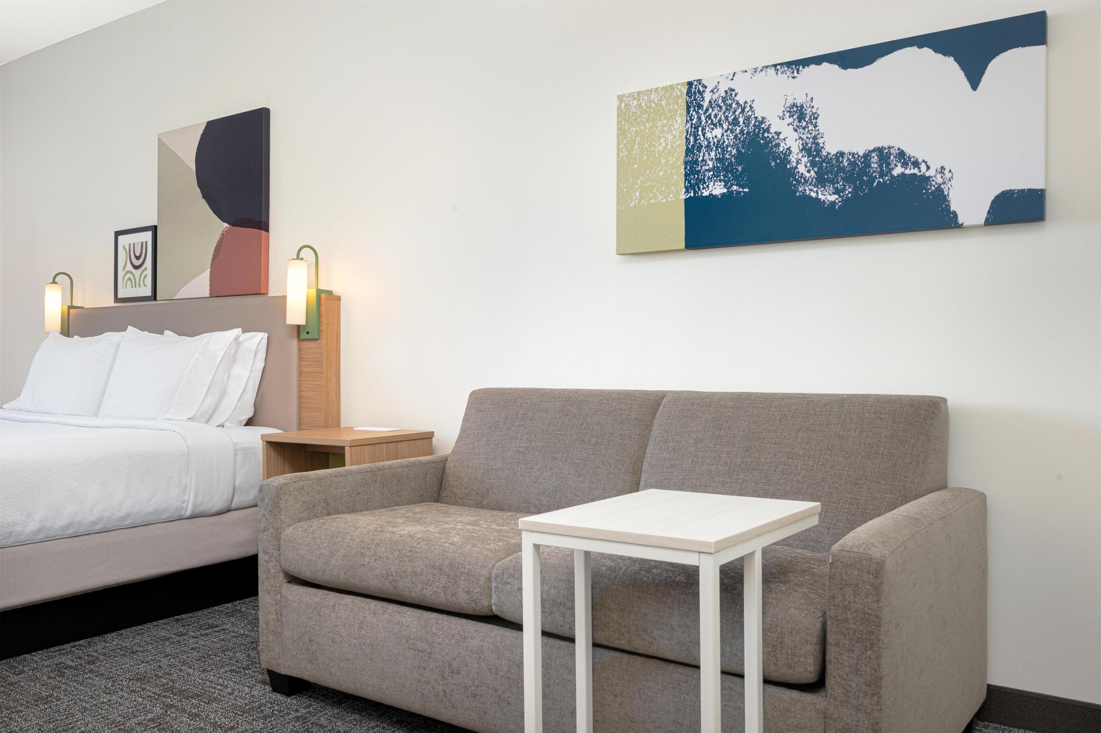 Room, 1 King Bed with Sofa bed | Living area | 27-inch TV with cable channels