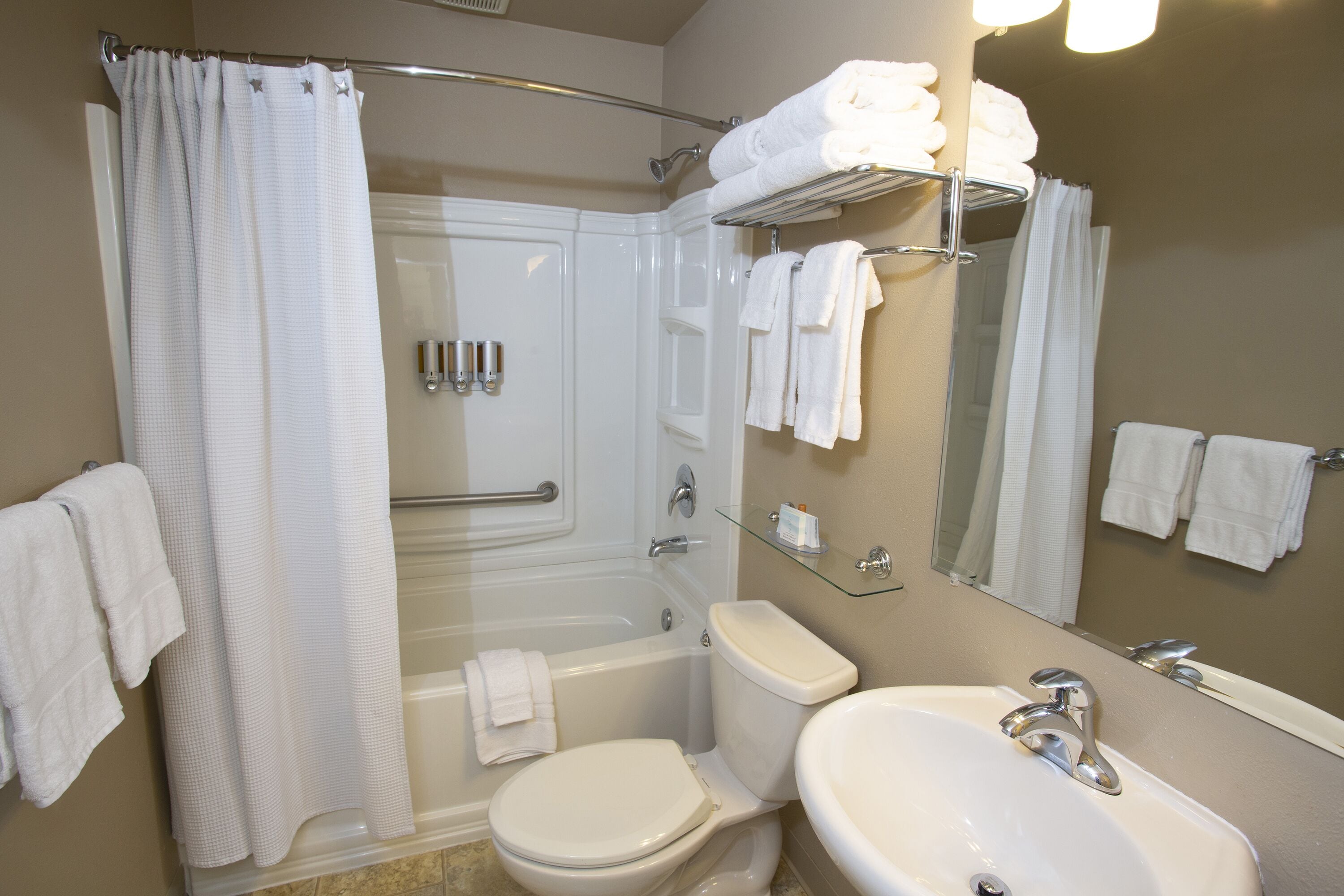 combined shower/bathtub, free toiletries, hair dryer, towels