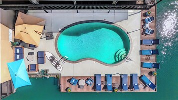 Outdoor pool, open 10:00 AM to 10:00 PM, sun loungers