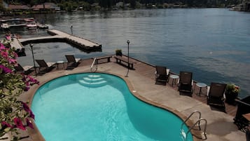Outdoor pool, open 10:00 AM to 10:00 PM, sun loungers
