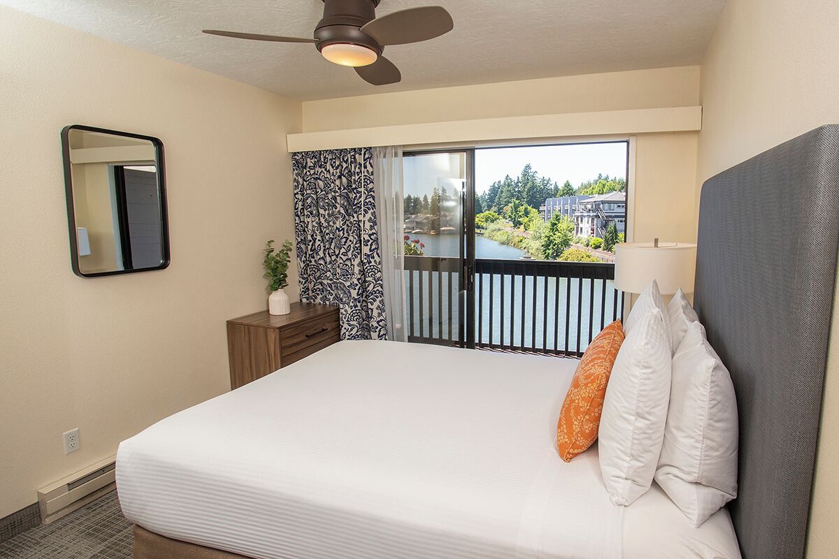 Superior Suite, 2 Bedrooms, Lake View | Laptop workspace, blackout drapes, iron/ironing board, free WiFi