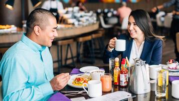 Daily buffet breakfast (USD 33 per person)