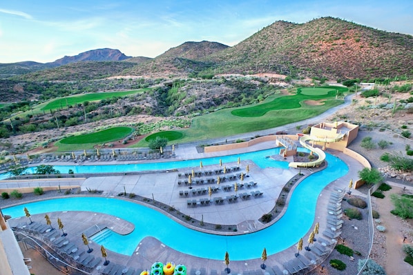 A resort with a large swimming pool, a golf course, and a mountain backdrop. - JW Marriott Starr Pass Resort and Spa (Tucson)