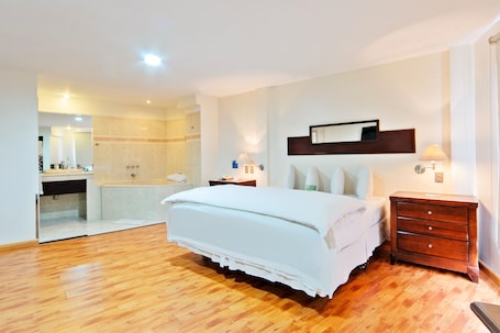 Suite | Premium bedding, down comforters, memory foam beds, minibar