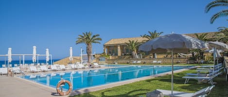 Outdoor pool, pool umbrellas, pool loungers