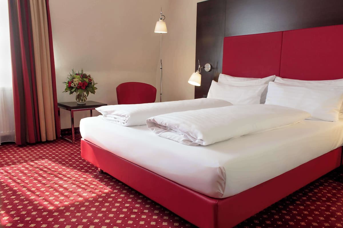Ropa de cama de alta calidad y minibar