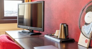 Habitación individual Confort | Ropa de cama de alta calidad y minibar 