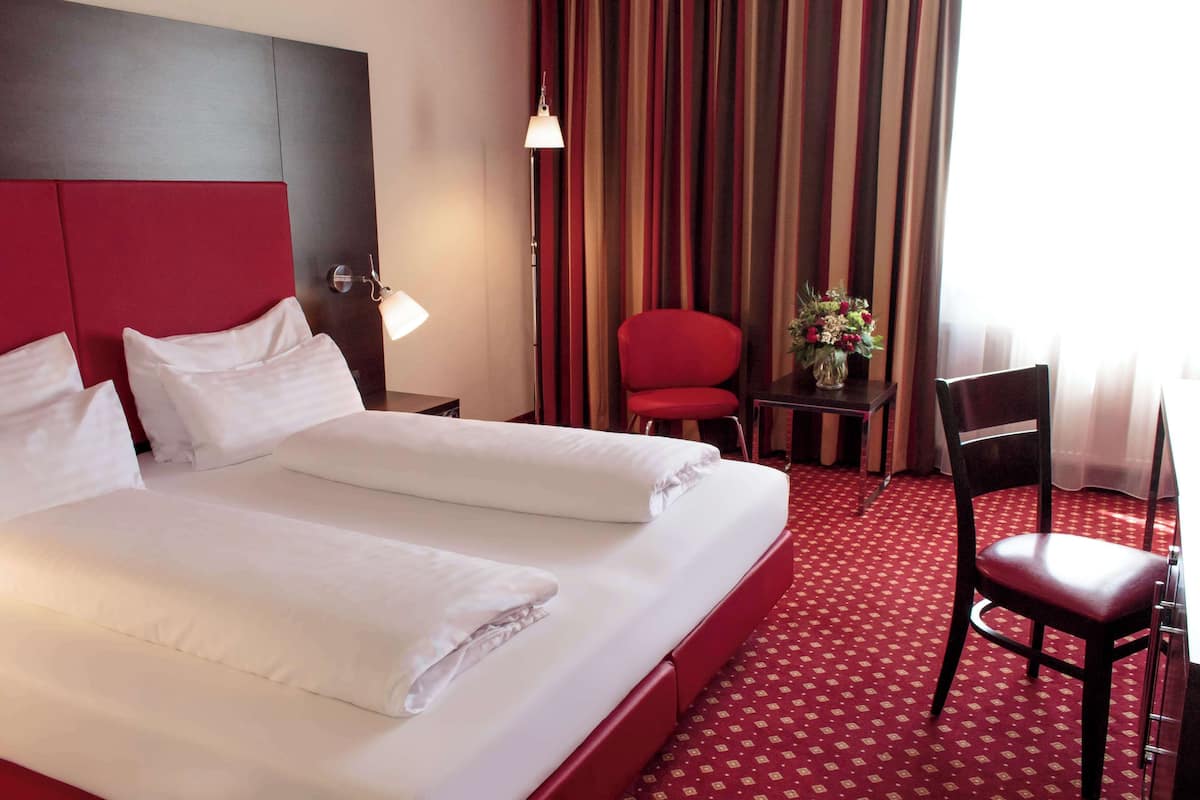 Ropa de cama de alta calidad y minibar