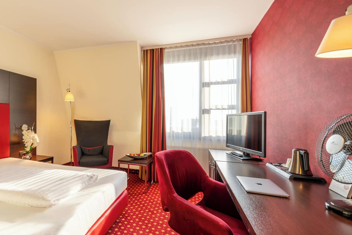 Chambre Simple Confort | Literie de qualité supérieure, minibar, coffres-forts dans les chambres