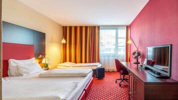 Chambre Triple Confort | Literie de qualité supérieure, minibar, coffres-forts dans les chambres