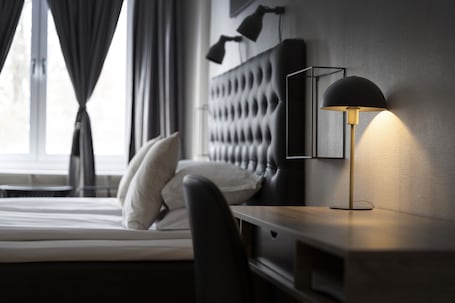 Ropa de cama de alta calidad y tabla de planchar con plancha