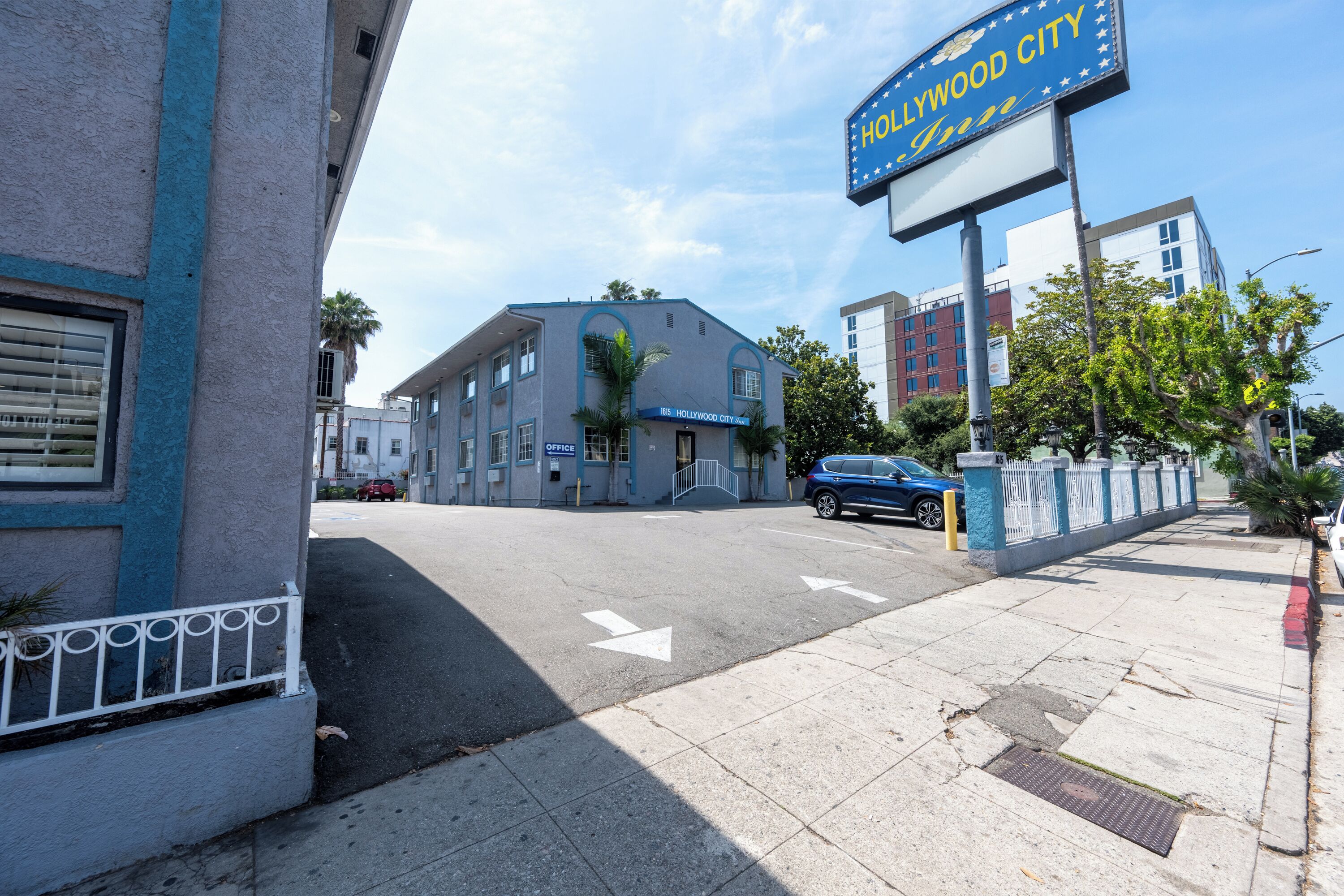 A building with a sign reading "Hollywood City."