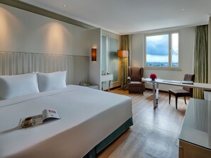 Deluxe Single Room, 1 Queen Bed, City View | Minibar, in-room safe, desk, soundproofing