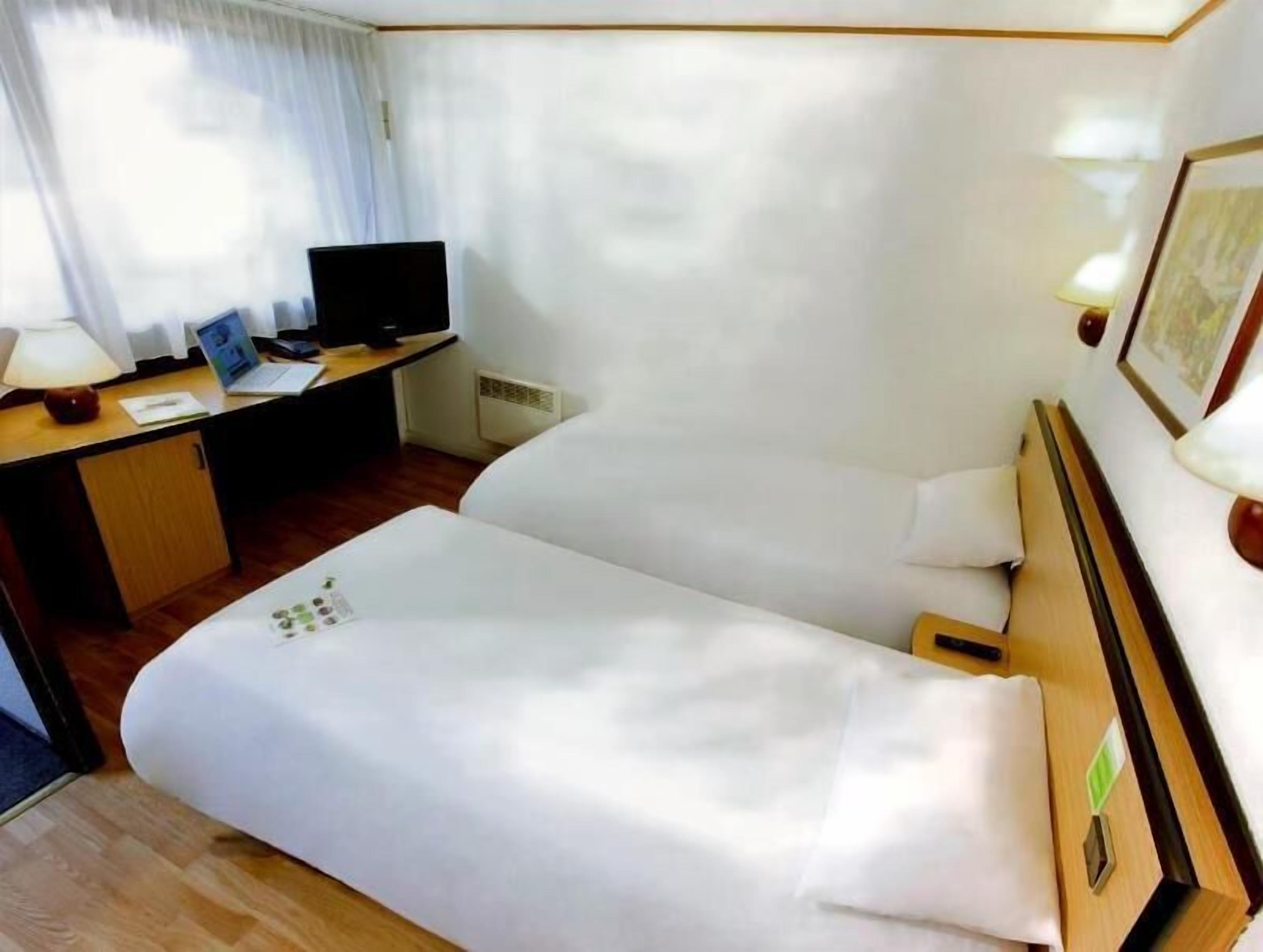 Desk, blackout curtains, soundproofing, iron/ironing board