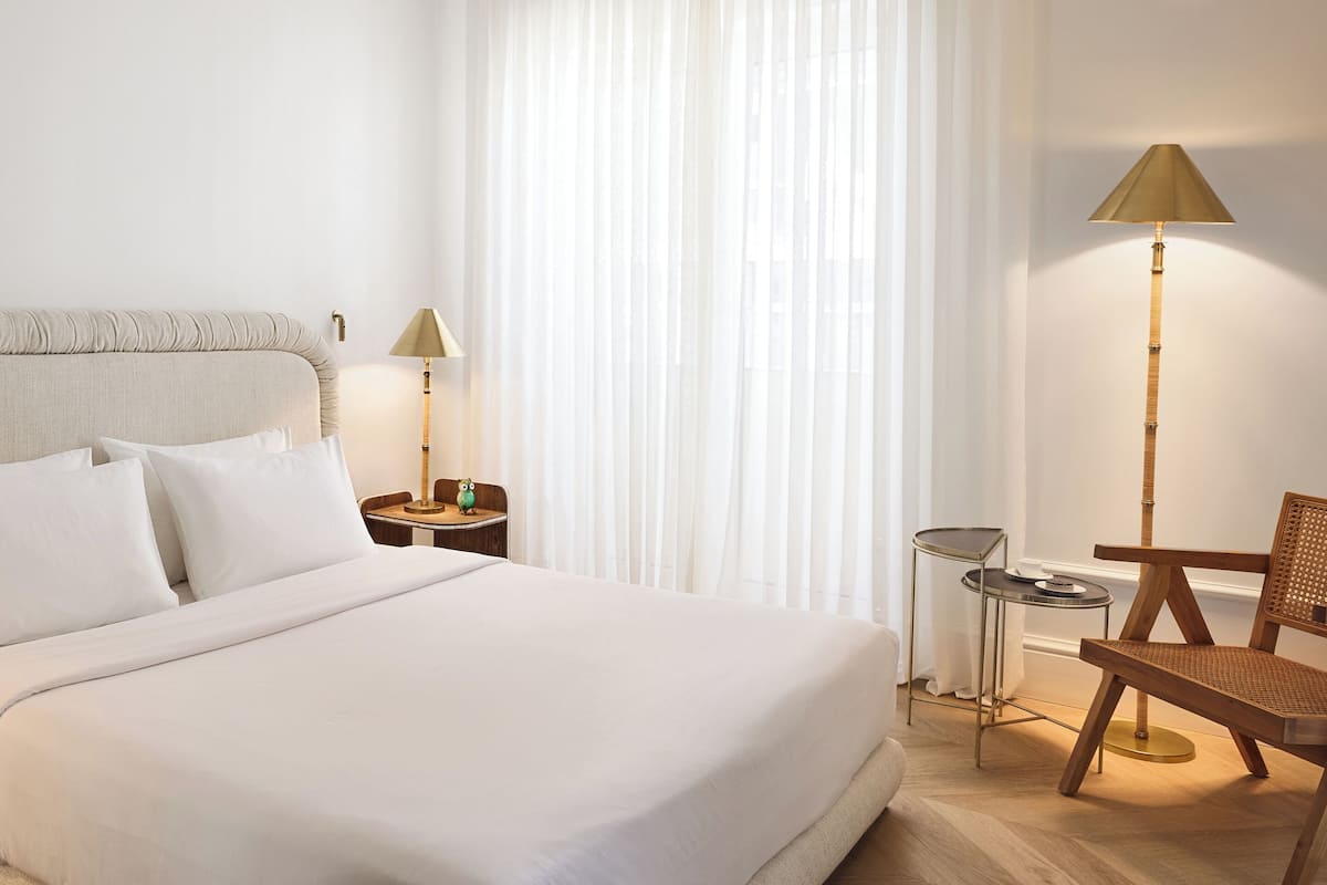Family Apartment | Premium bedding, minibar, in-room safe, blackout drapes