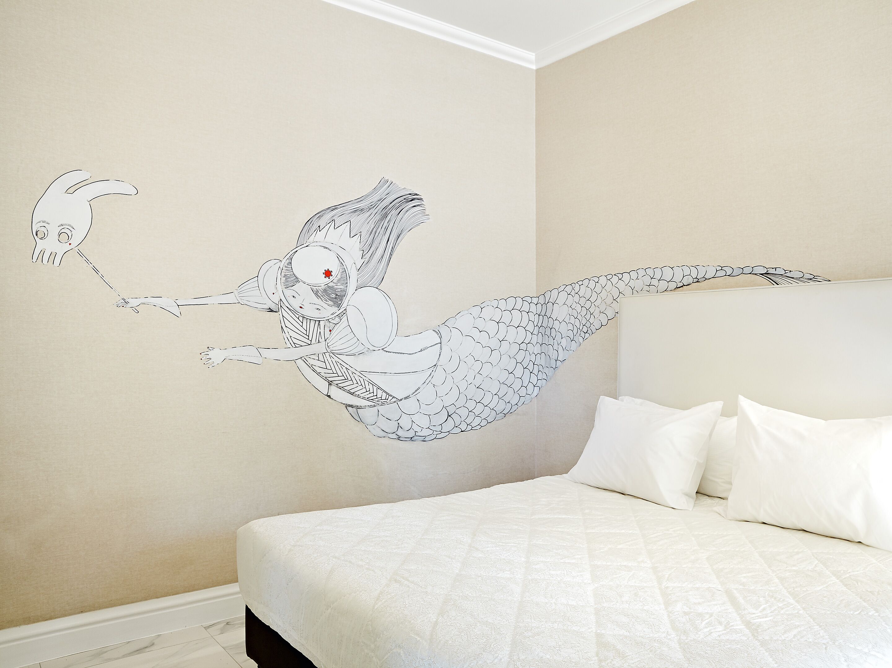 premium graffiti guestroom | premium bedding, minibar, in-room safe, blackout curtains