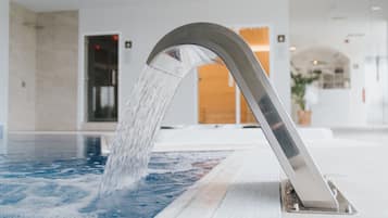 Indoor pool, seasonal outdoor pool, pool umbrellas, pool loungers